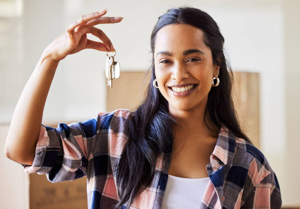 Woman holding keys.
